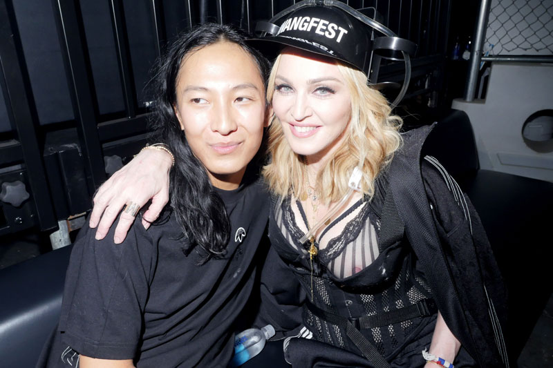 Madonna #nipple #slip while taking a picture with a fan.
